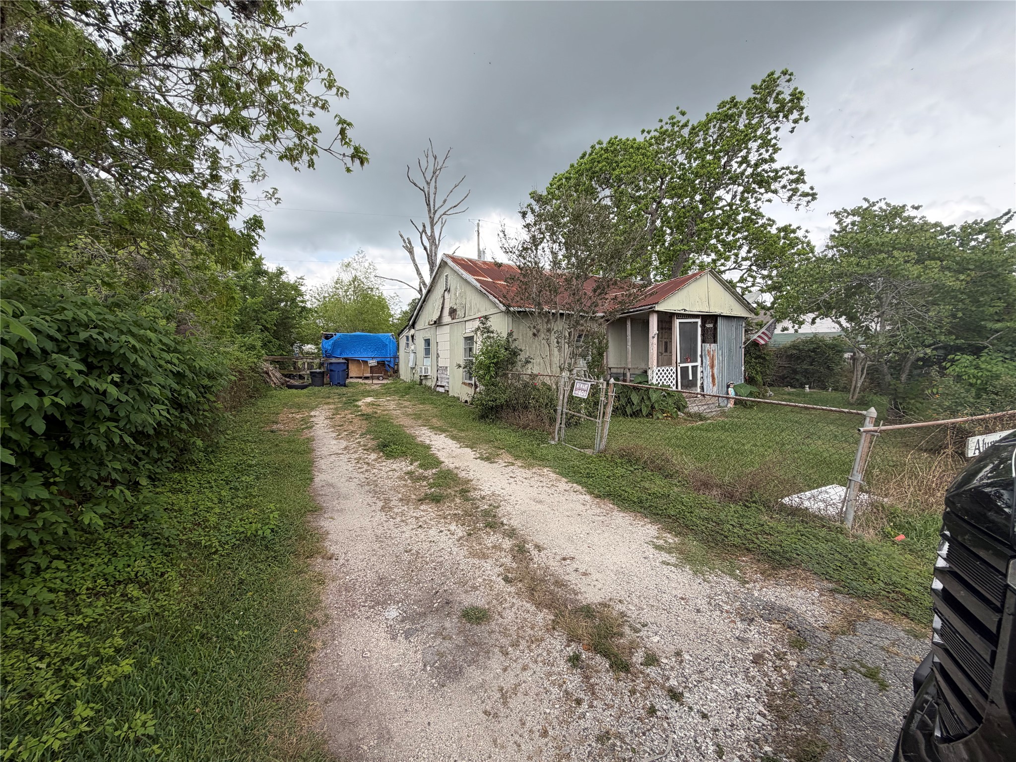 2212 Highway 288 Business Angleton, TX 77515 - Photo 7 of 7 a view of a house with a yard