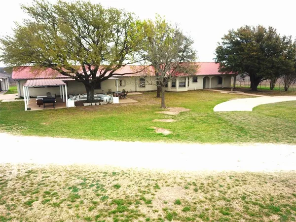 a view of a house with a swimming pool