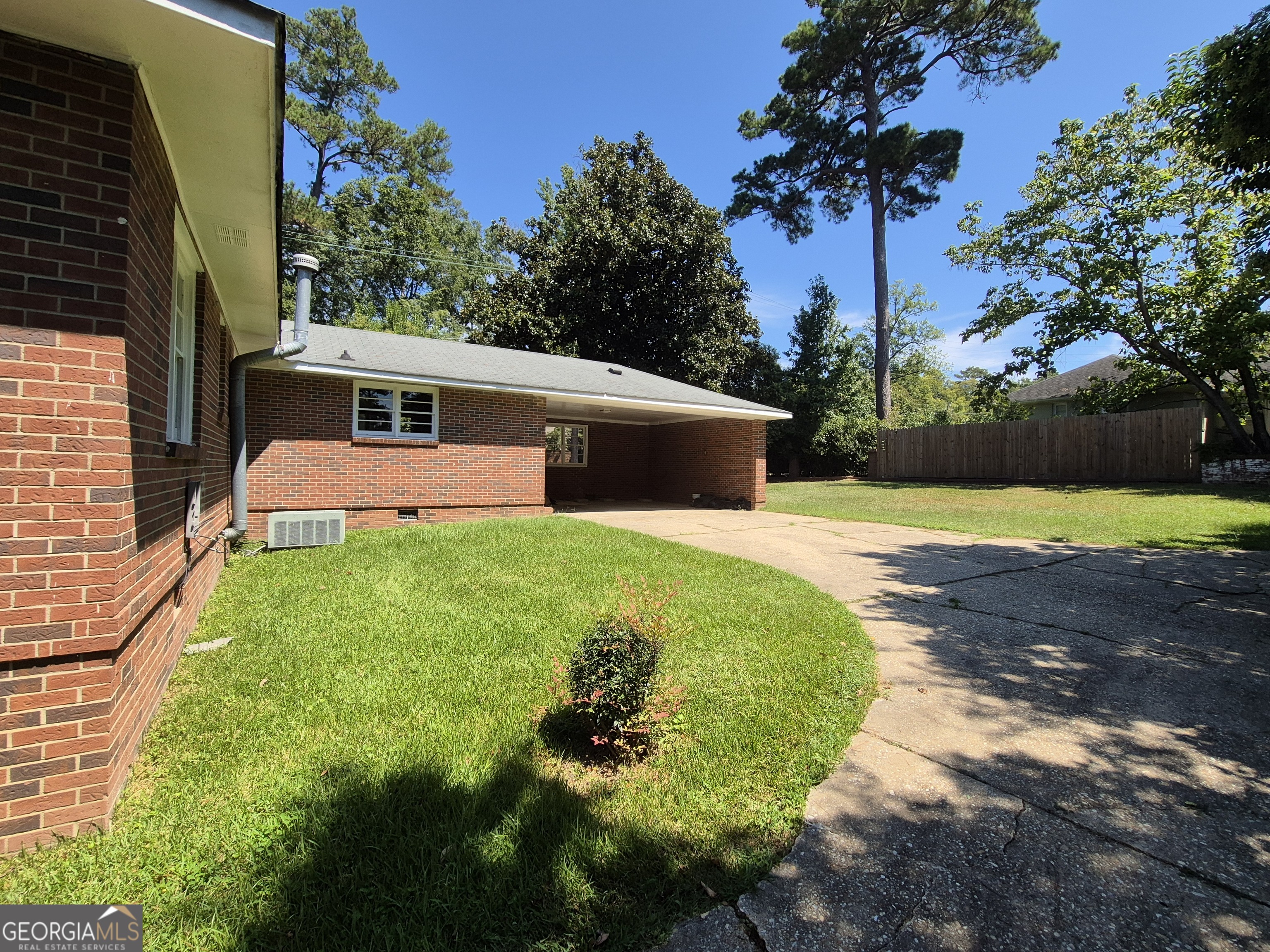 1908 Garrard Street Columbus, GA 31906 - Photo 3 of 14 a front view of a house with garden