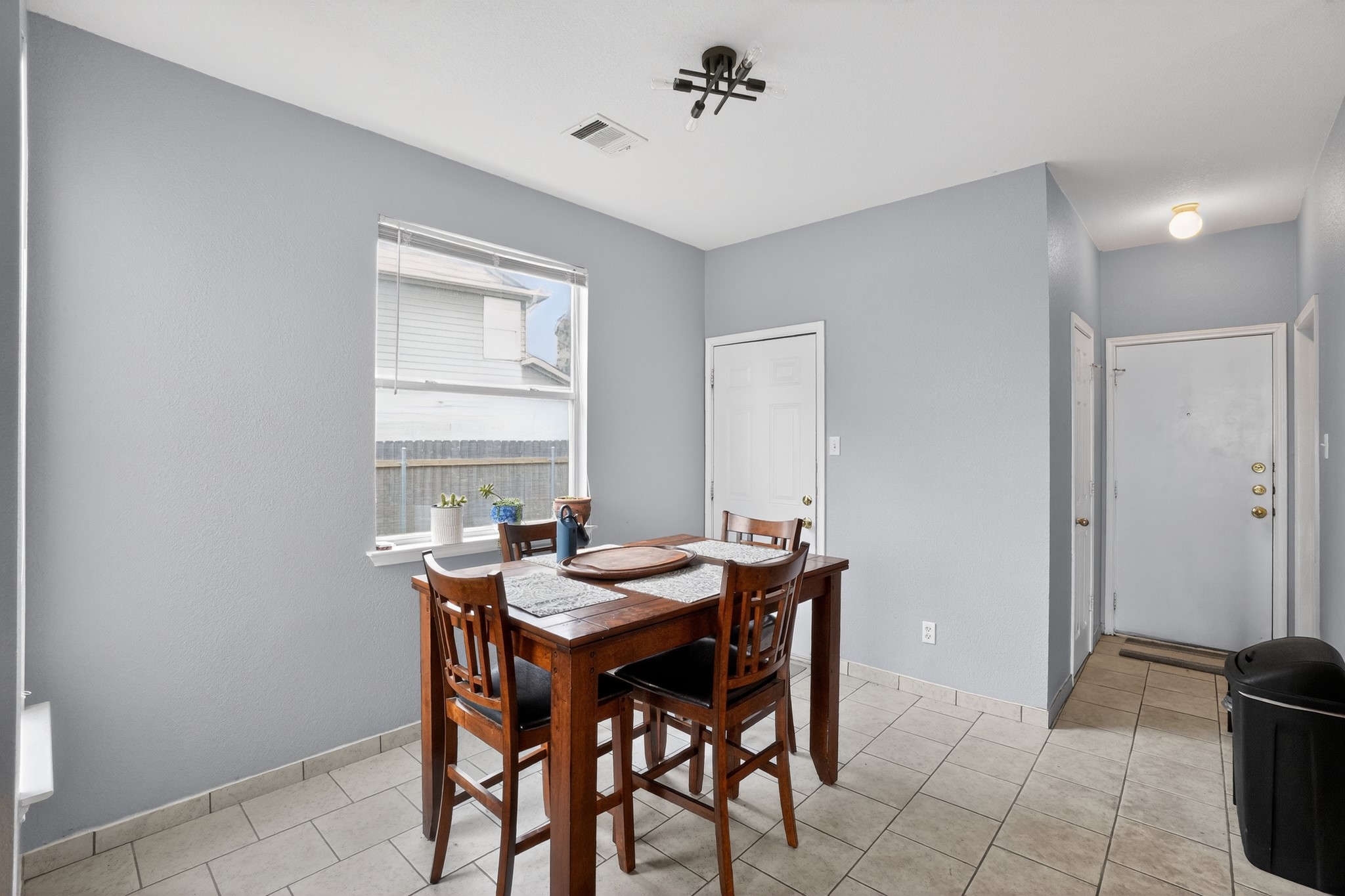 13808 Harris Ridge Boulevard Pflugerville, TX 78660 - Photo 16 of 40 a view of a dining room with furniture