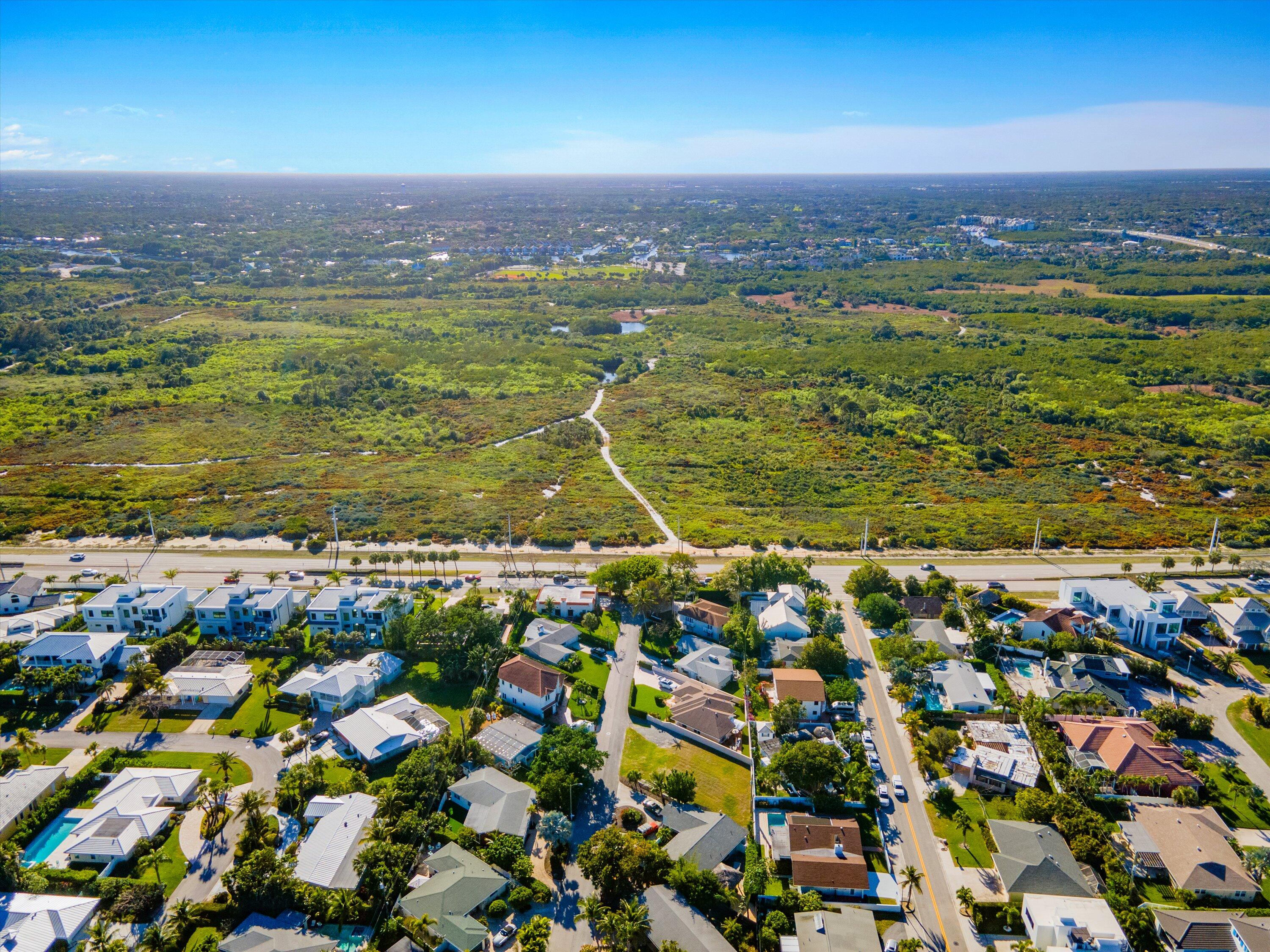 451 Neptune Road Juno Beach, FL 33408 - Photo 13 of 13 an aerial view of residential houses with outdoor space