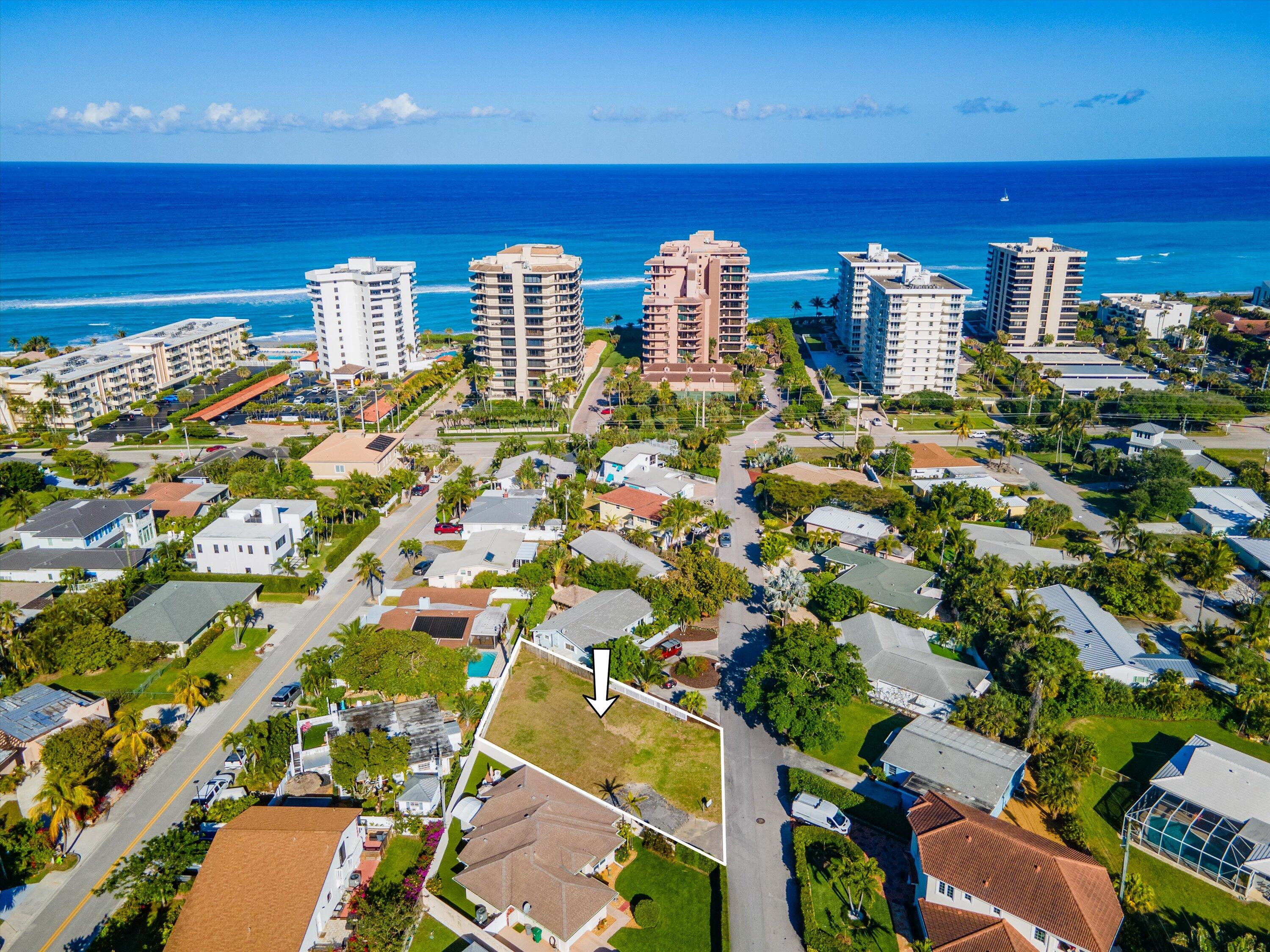 451 Neptune Road Juno Beach, FL 33408 - Photo 3 of 13 a city view with tall buildings