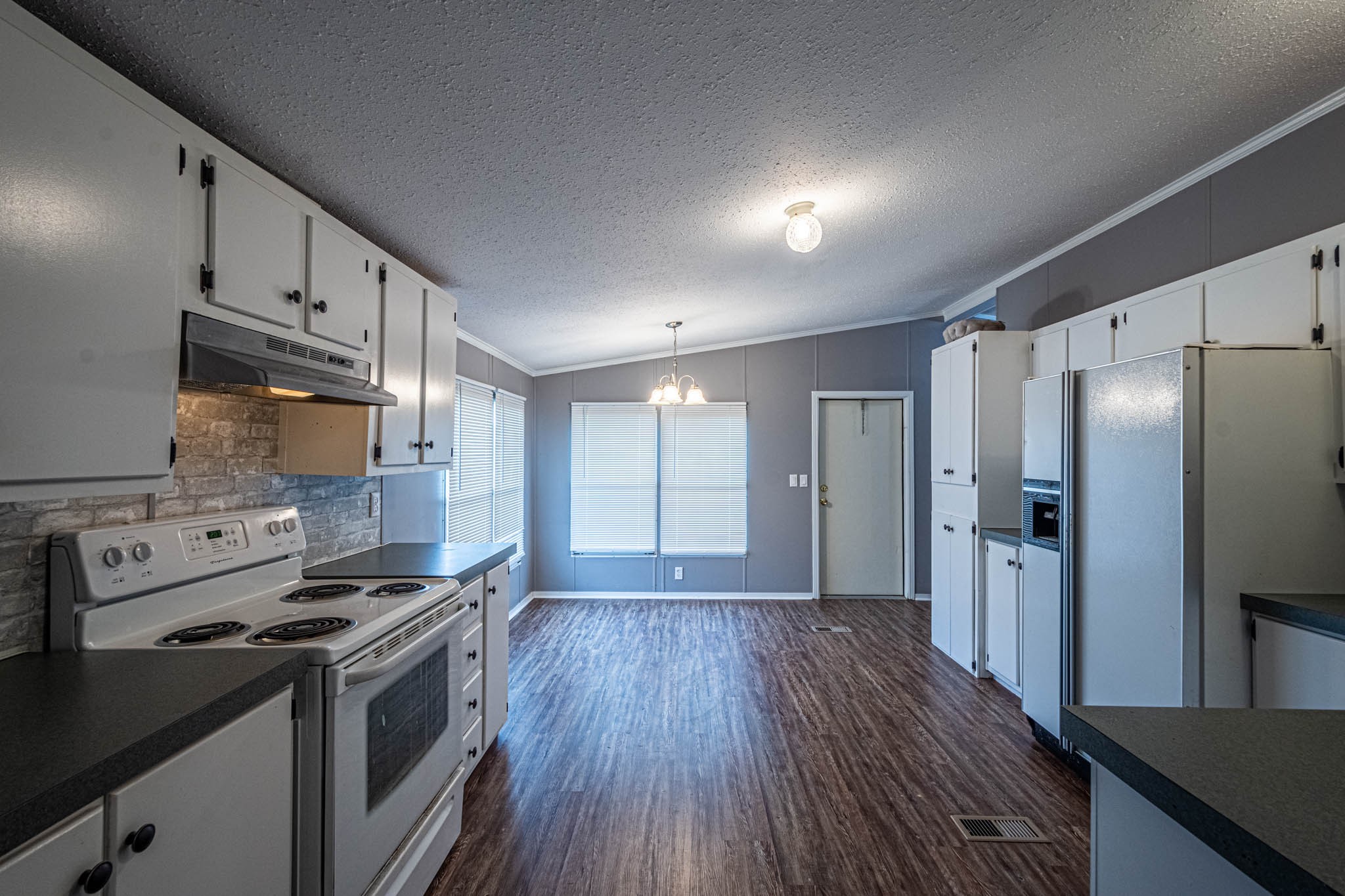 3375 Salem Road Minor Hill, TN 38473 - Photo 12 of 42 a kitchen with a stove a refrigerator and a sink