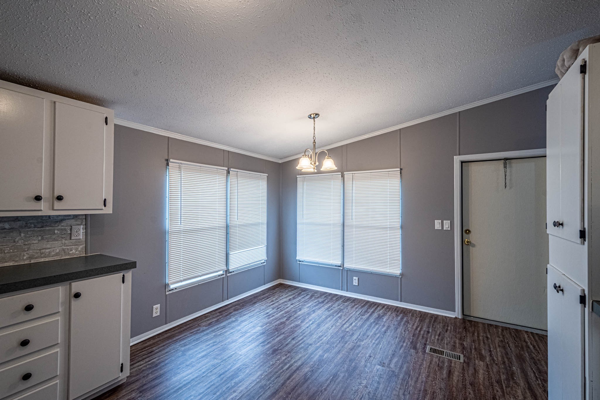 3375 Salem Road Minor Hill, TN 38473 - Photo 15 of 42 an empty room with cabinet and wooden floor