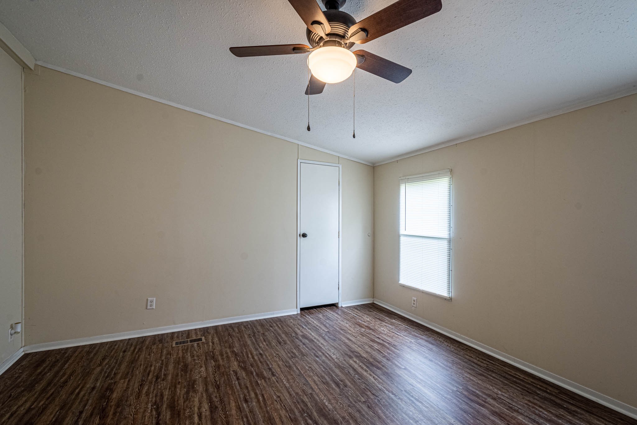3375 Salem Road Minor Hill, TN 38473 - Photo 19 of 42 wooden floor in an empty room with a window