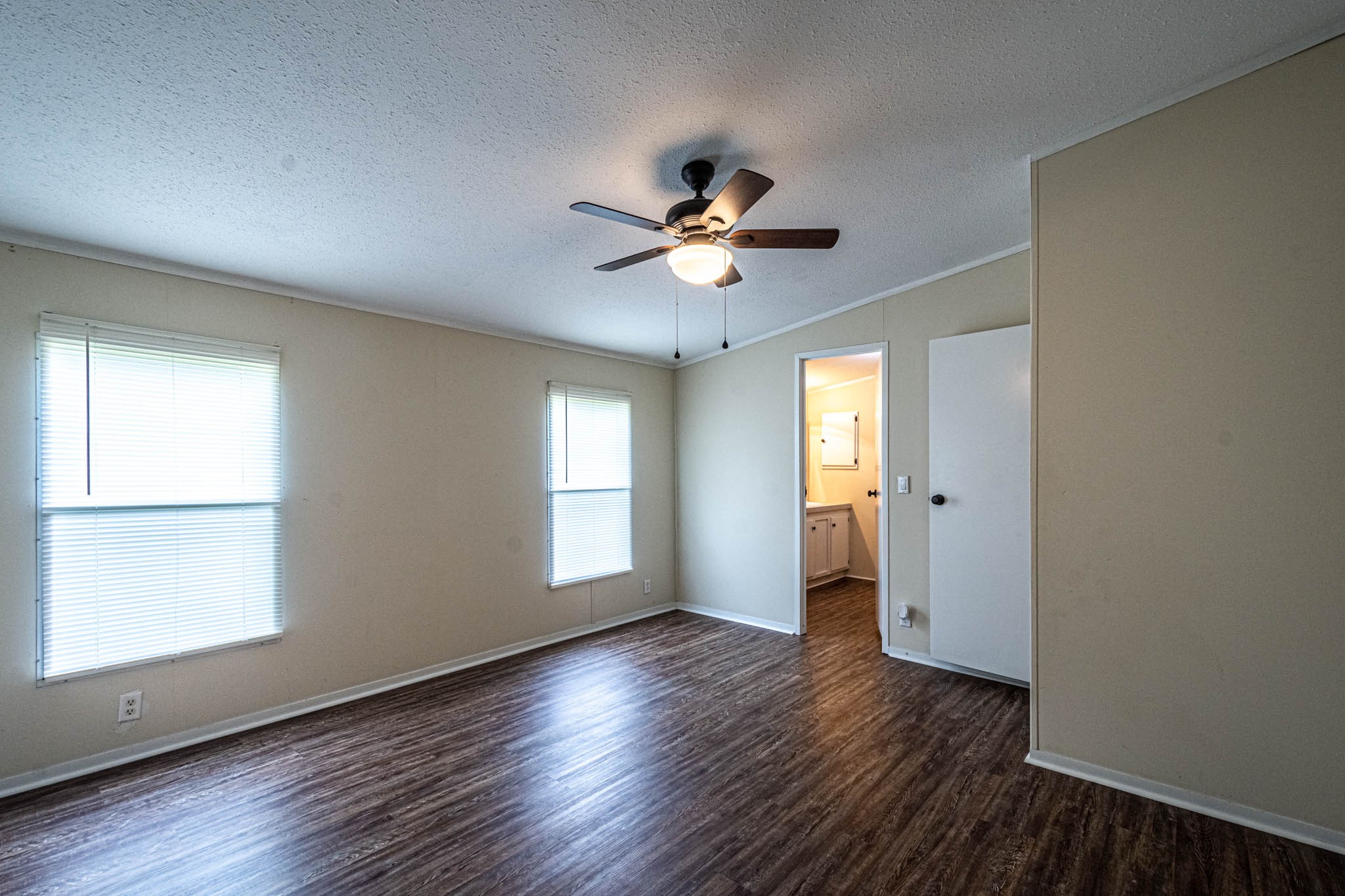 3375 Salem Road Minor Hill, TN 38473 - Photo 21 of 42 a view of empty room with wooden floor and fan