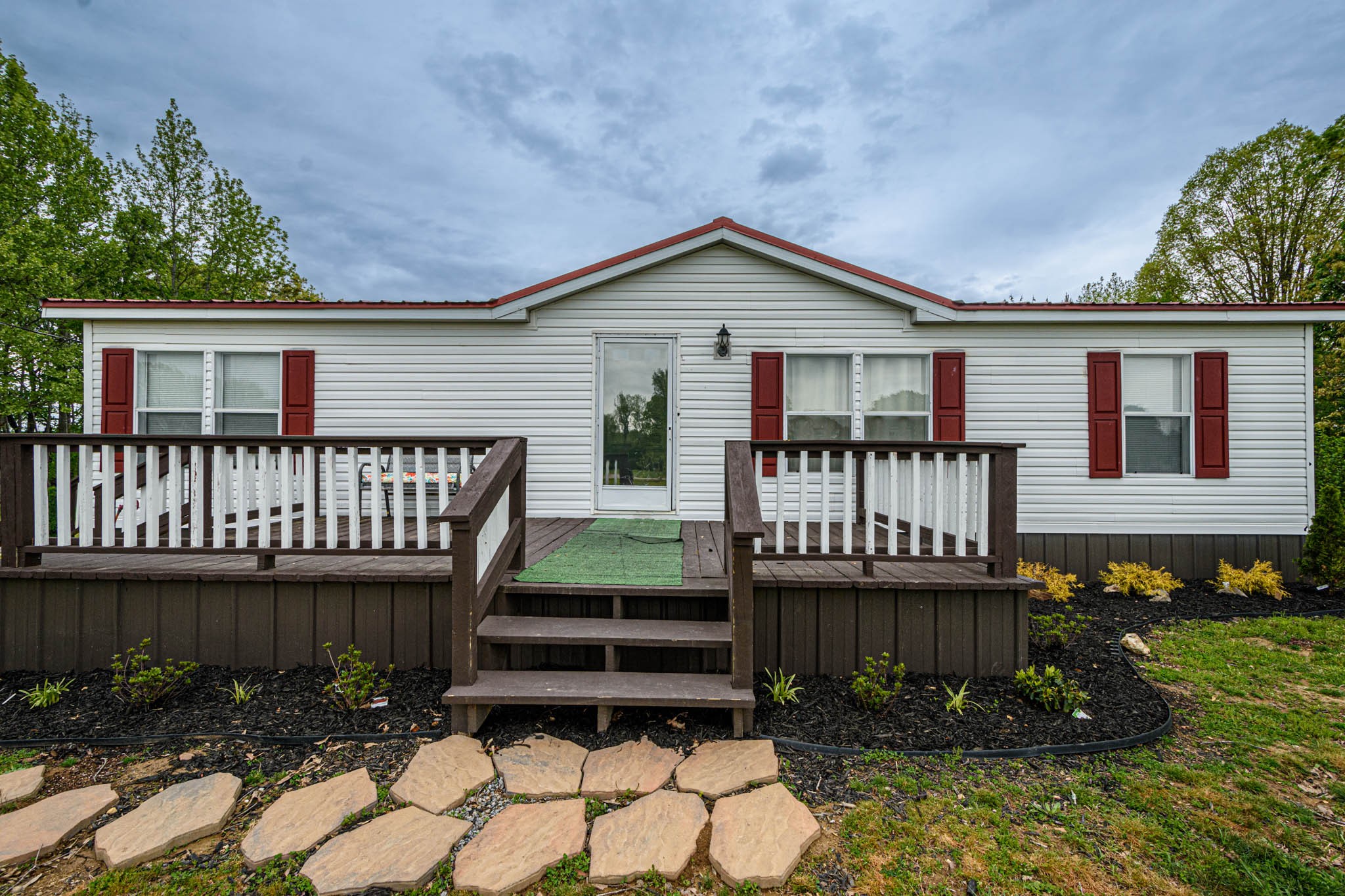 3375 Salem Road Minor Hill, TN 38473 - Photo 3 of 42 a view of a house with wooden deck front of house