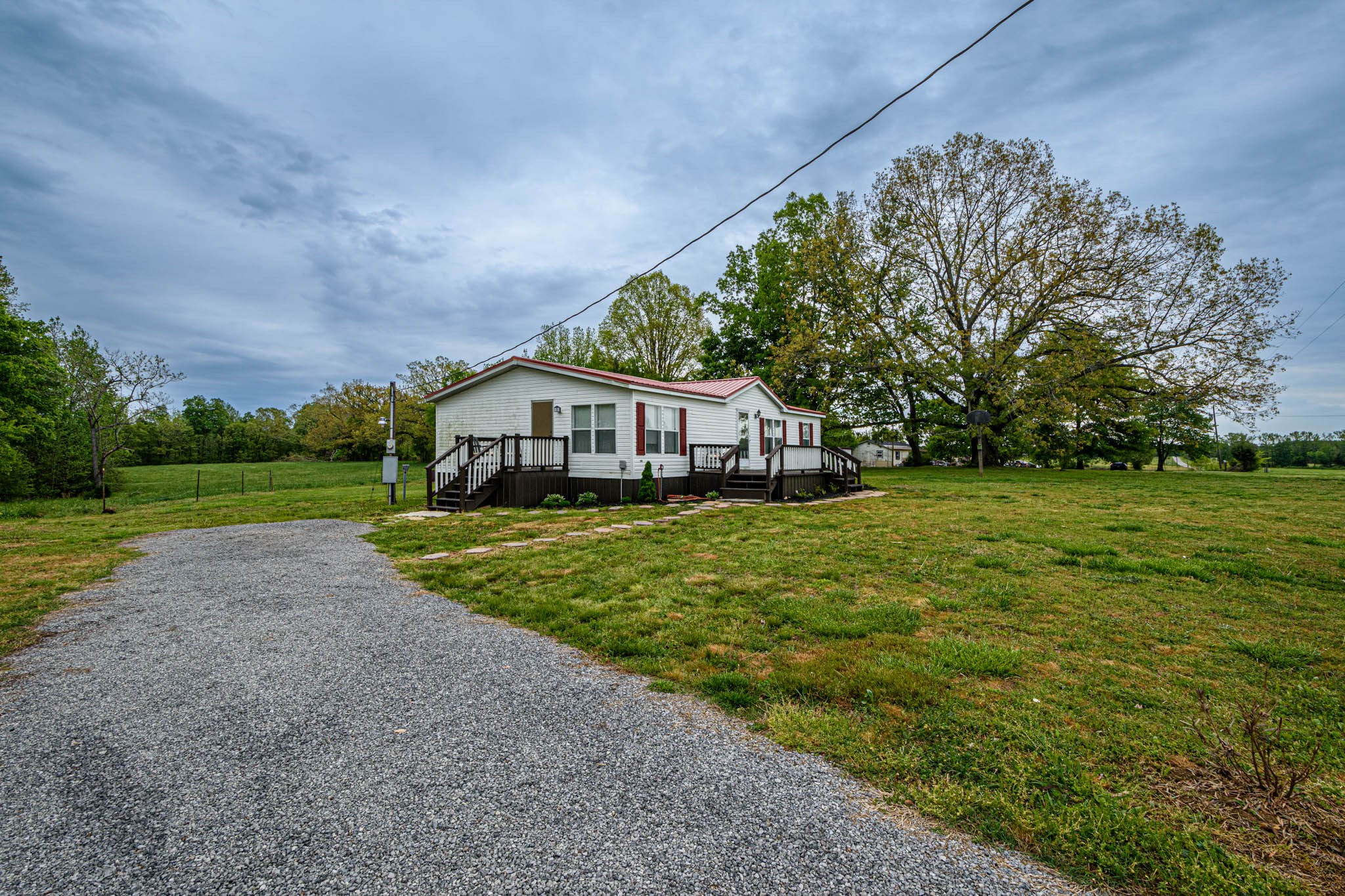 3375 Salem Road Minor Hill, TN 38473 - Photo 31 of 42 a yellow and green house with a big yard