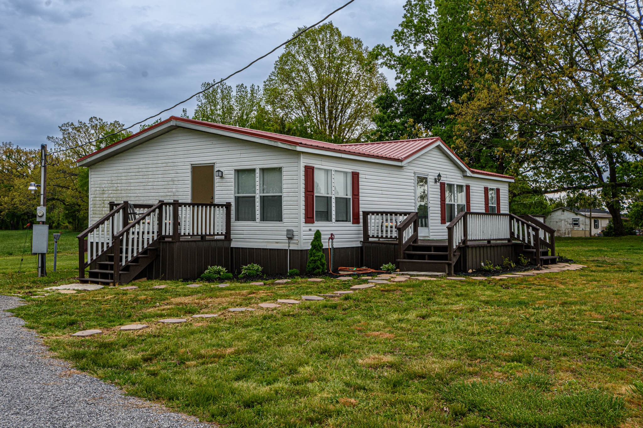 3375 Salem Road Minor Hill, TN 38473 - Photo 32 of 42 a view of a house with a yard and sitting area