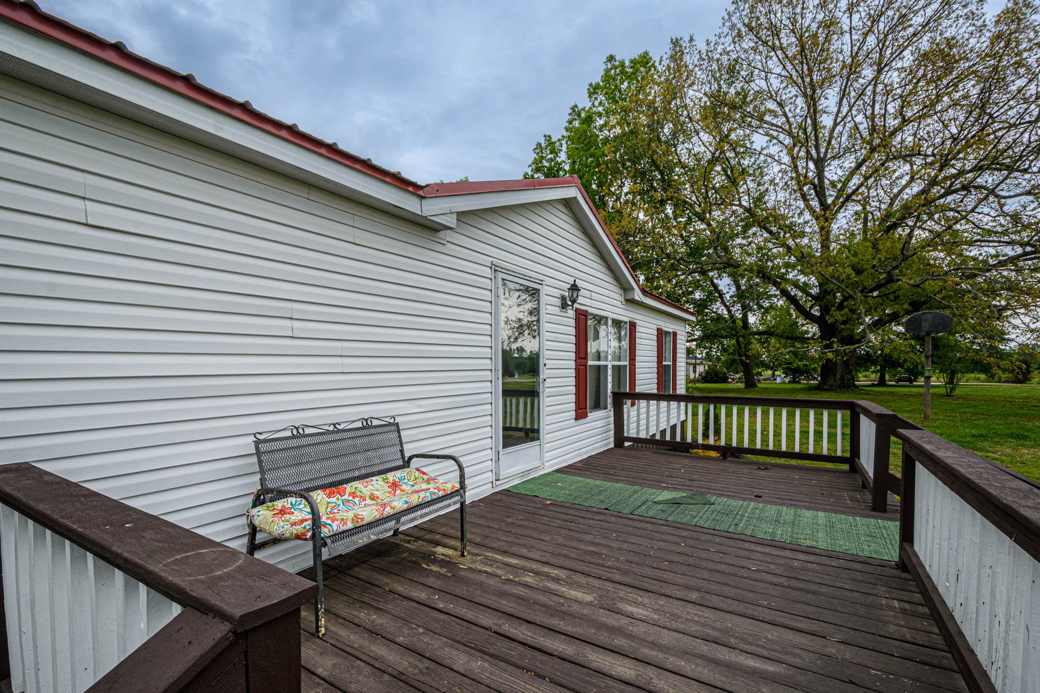 3375 Salem Road Minor Hill, TN 38473 - Photo 34 of 42 a view of a roof deck with wooden floor and fence