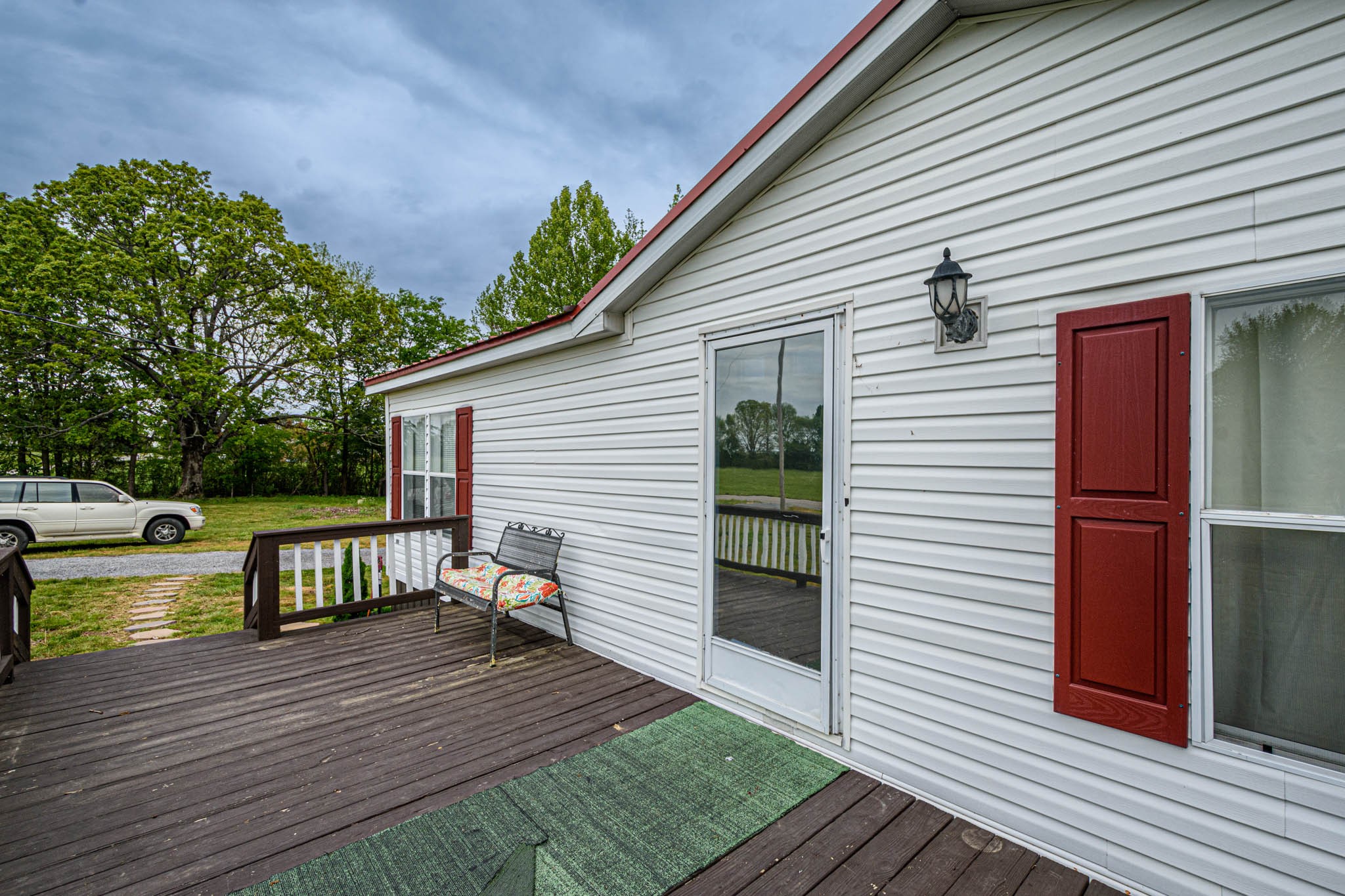 3375 Salem Road Minor Hill, TN 38473 - Photo 35 of 42 a view of house with deck outdoor seating