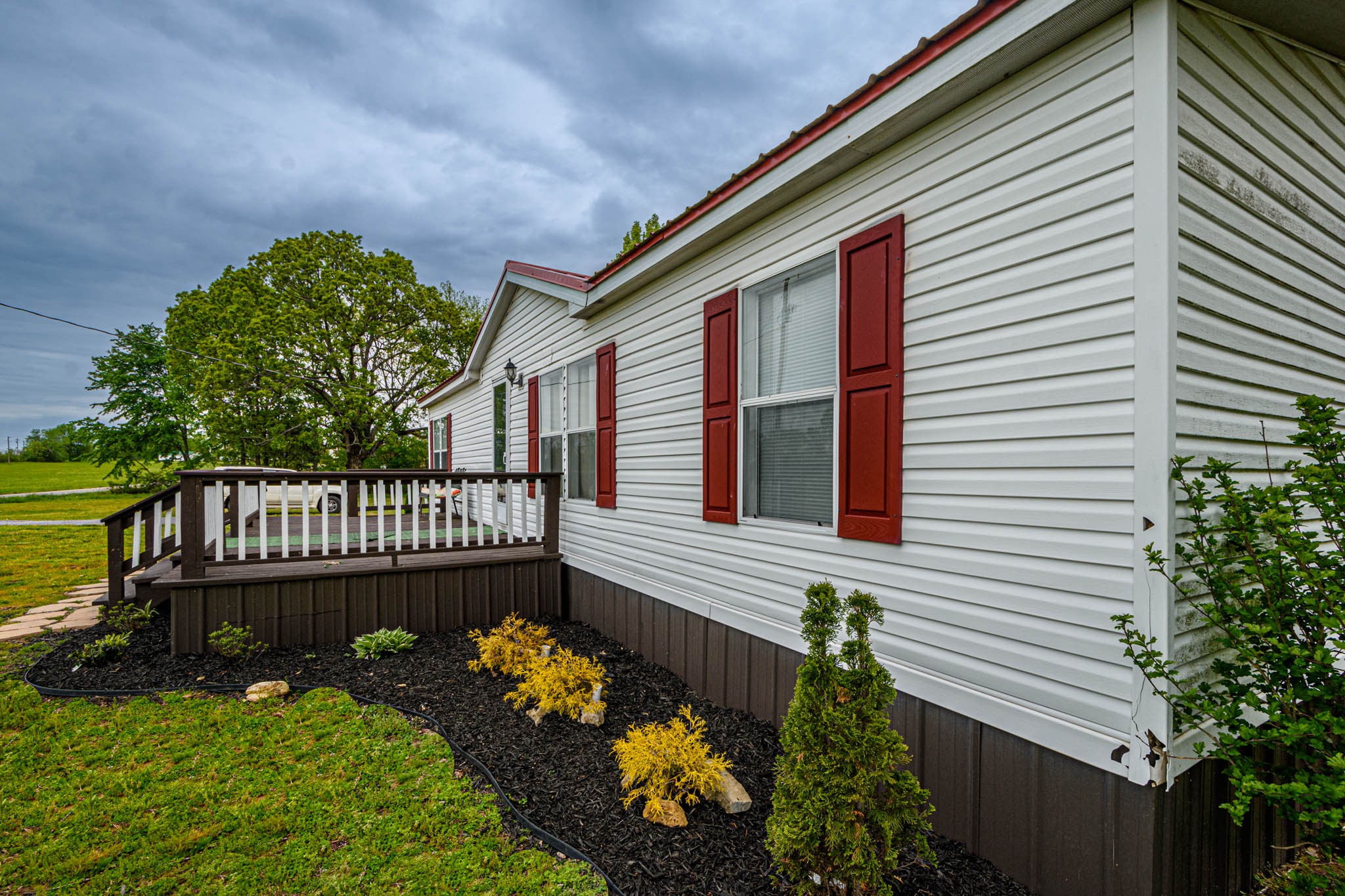 3375 Salem Road Minor Hill, TN 38473 - Photo 38 of 42 a front view of a house with a garden