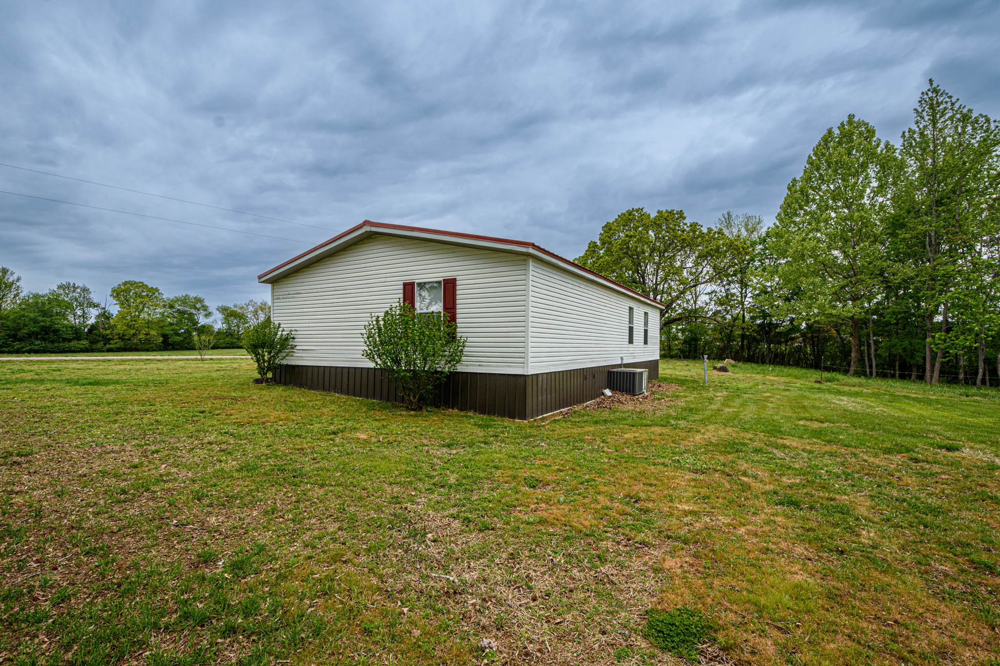3375 Salem Road Minor Hill, TN 38473 - Photo 39 of 42 a view of an house with backyard space and garden