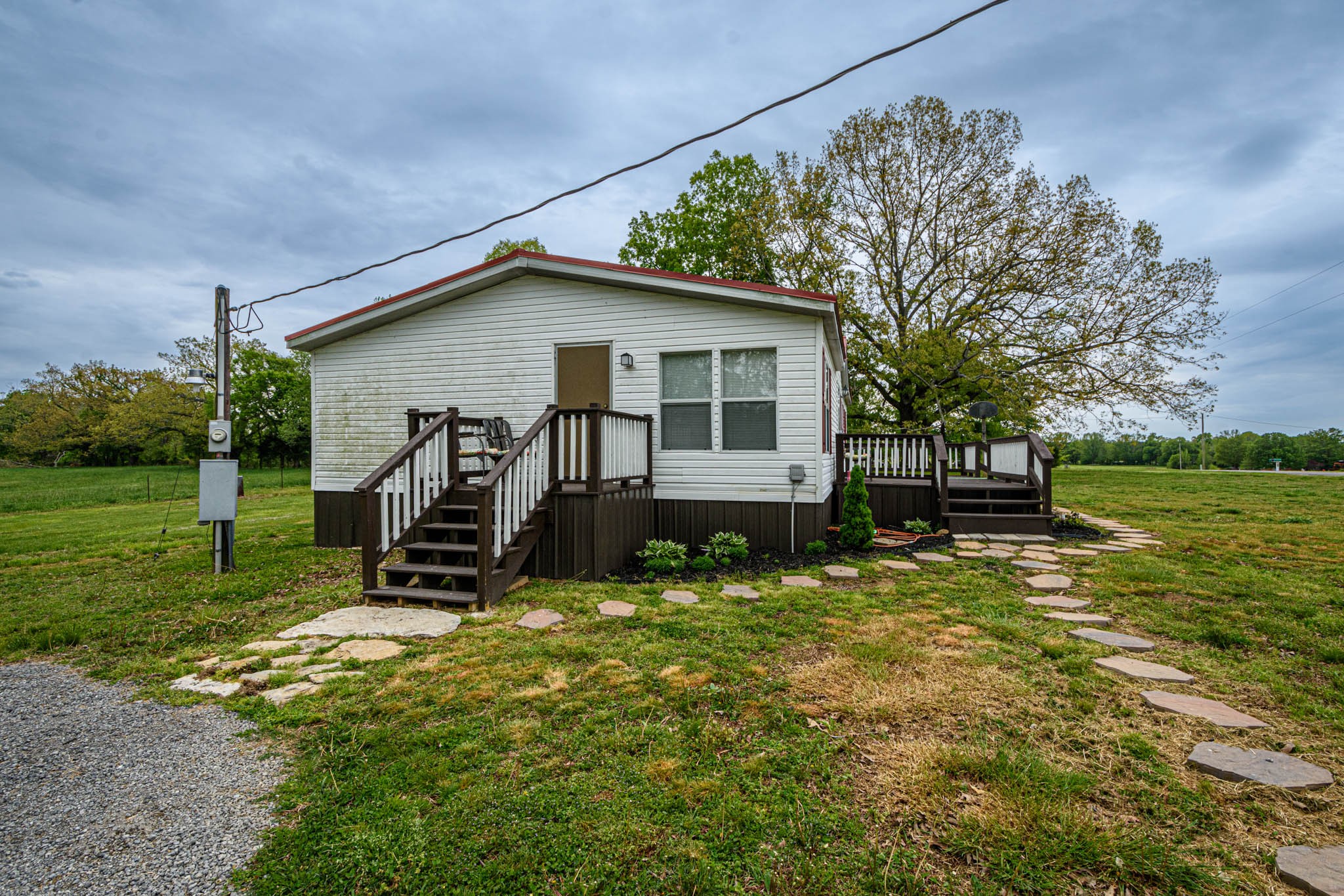 3375 Salem Road Minor Hill, TN 38473 - Photo 41 of 42 a backyard of a house with lots of green space