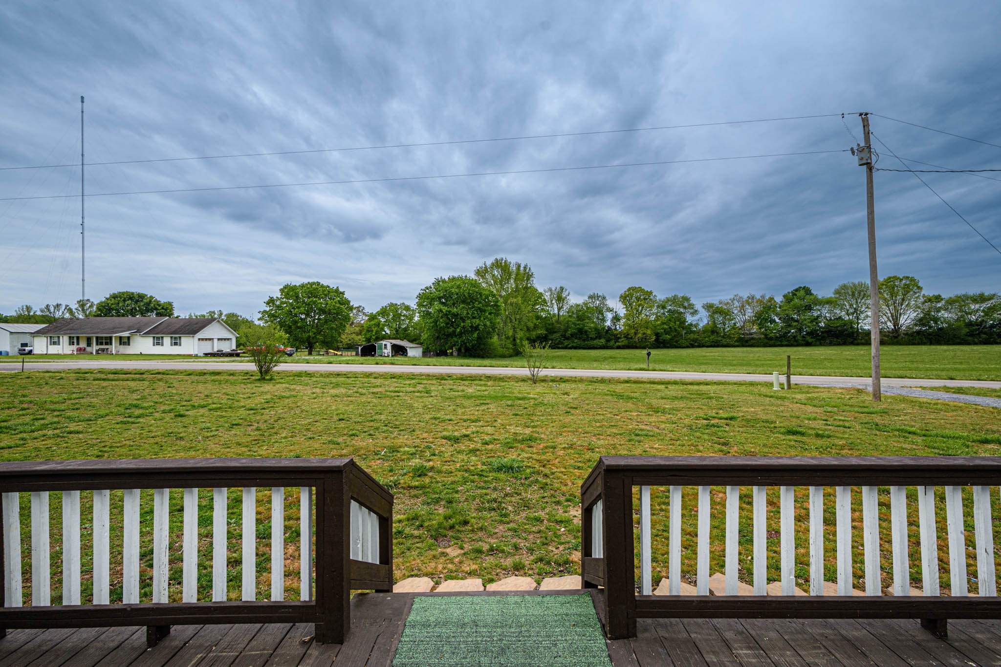 3375 Salem Road Minor Hill, TN 38473 - Photo 5 of 42 a view of a wooden deck and a lake view