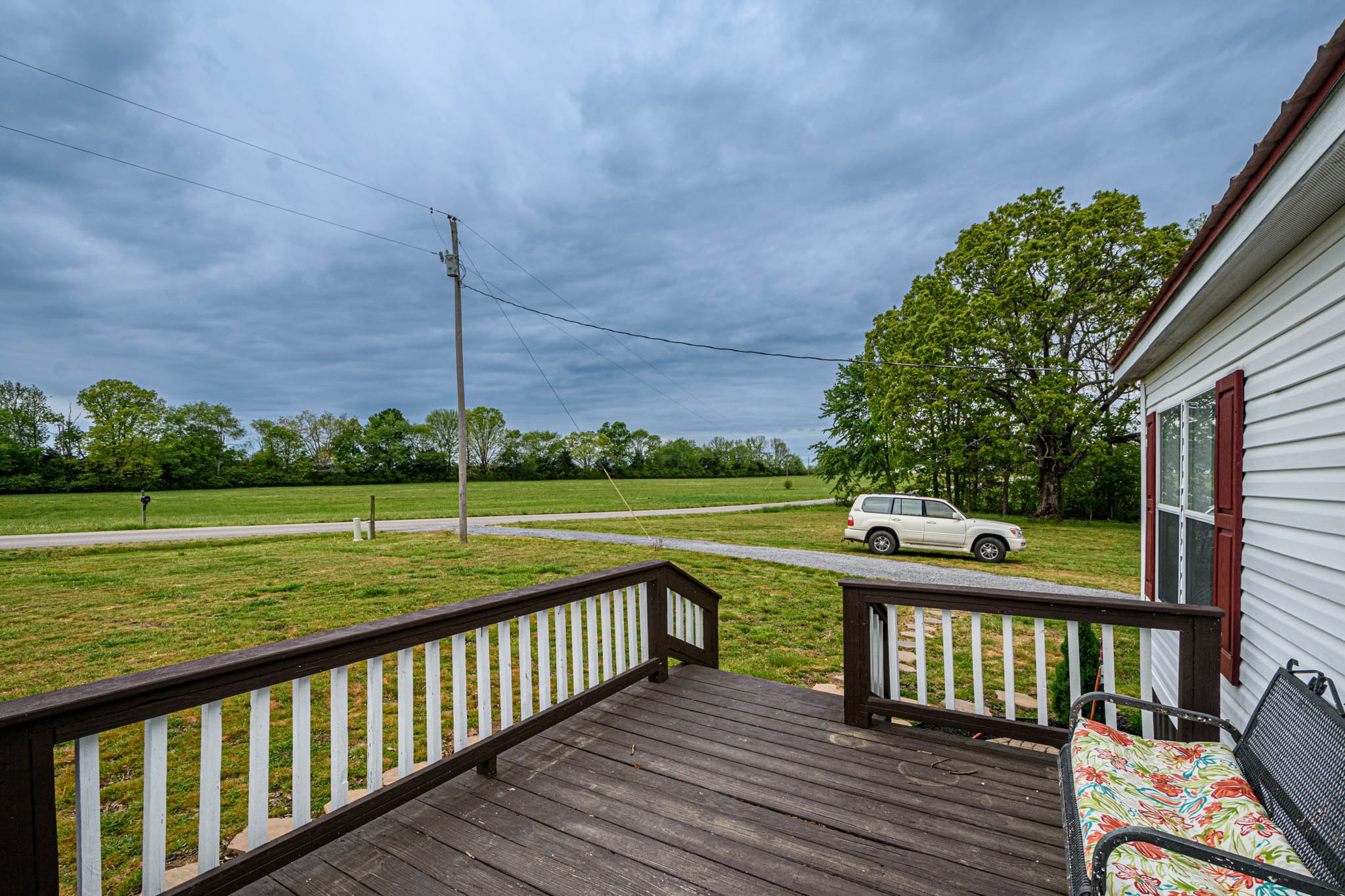 3375 Salem Road Minor Hill, TN 38473 - Photo 6 of 42 a view of a deck with a yard