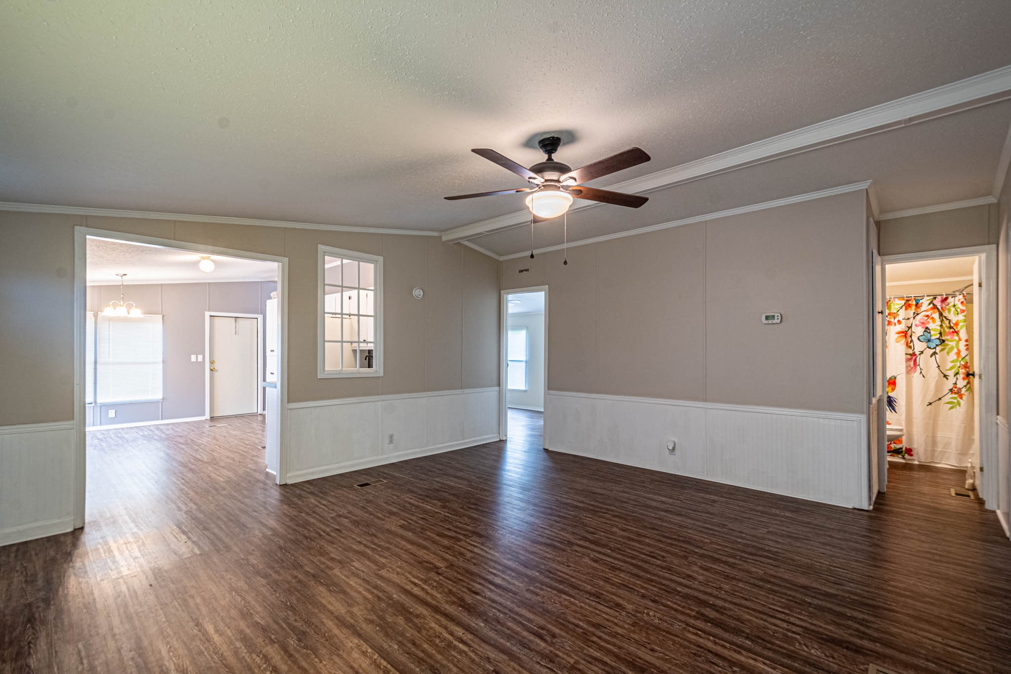 3375 Salem Road Minor Hill, TN 38473 - Photo 8 of 42 a view of an empty room with wooden floor and a window
