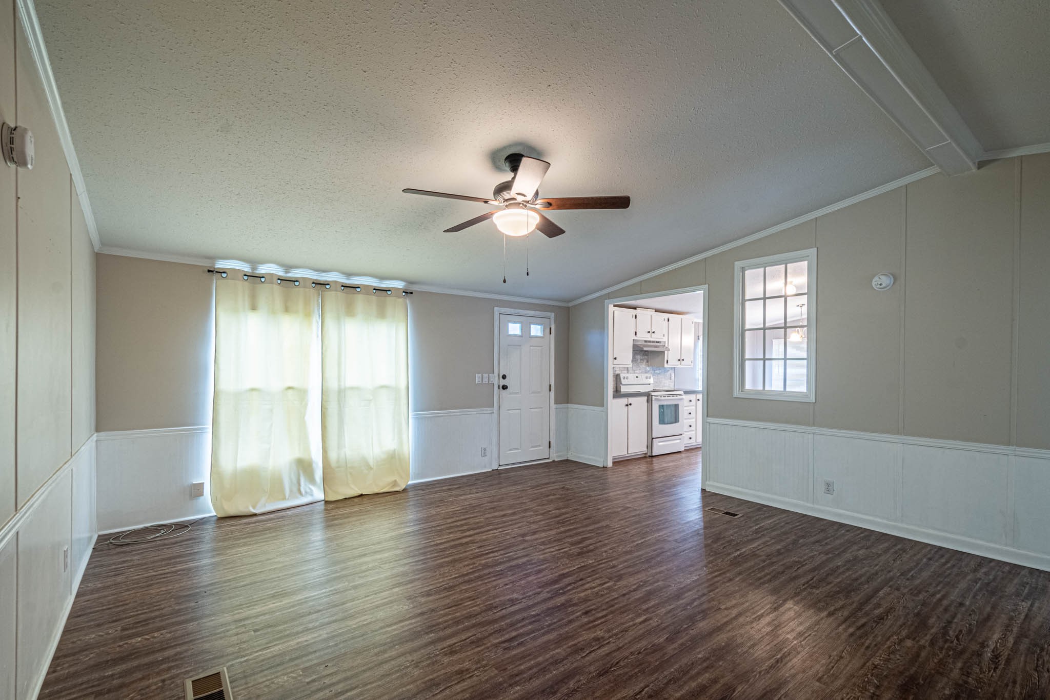 3375 Salem Road Minor Hill, TN 38473 - Photo 9 of 42 a view of an empty room with a window and wooden floor
