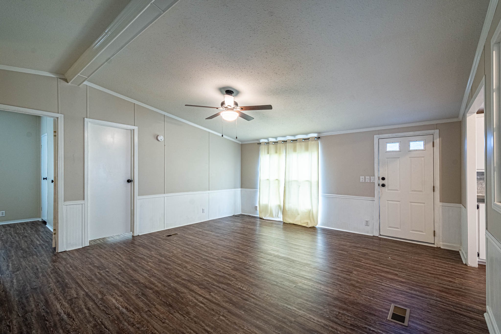 3375 Salem Road Minor Hill, TN 38473 - Photo 10 of 42 a view of an empty room with wooden floor and window