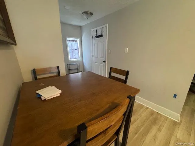 a view of kitchen and a window