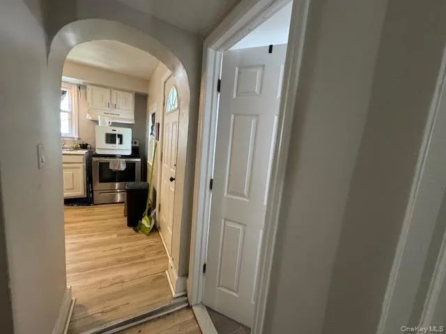 a view of a hallway view with living room