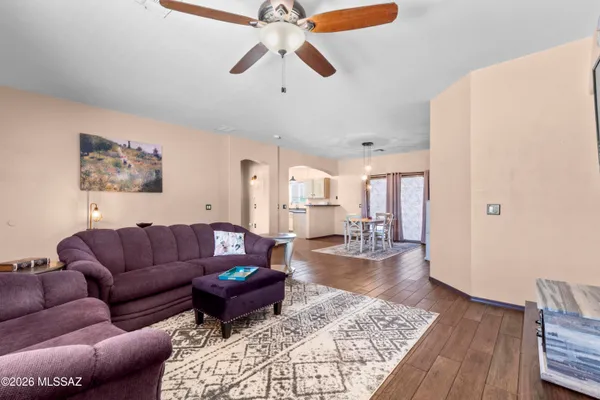 a living room with furniture and a rug
