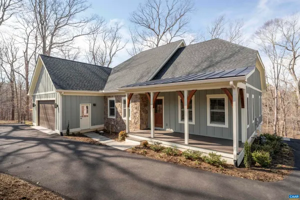 a front view of a house with a outdoor space