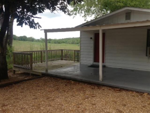 134 Carlisle Road Dover, TN 37058 - Photo 3 of 10 The sun deck overlooks the creek and neighboring pasture.