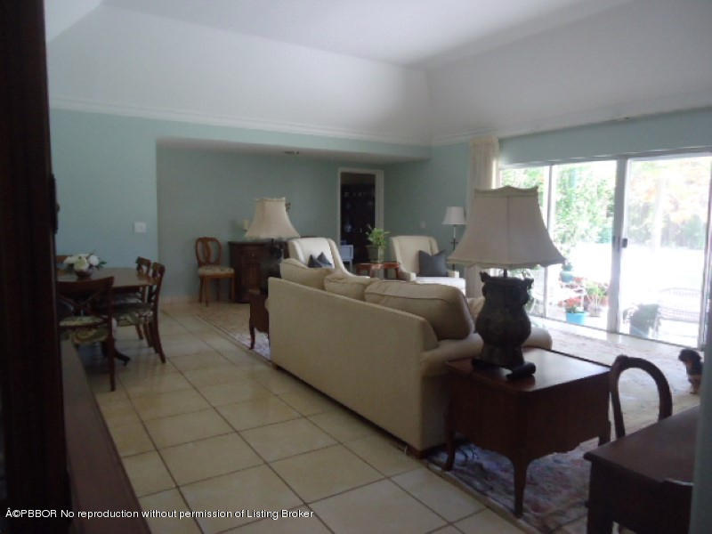 5 Little Pond Road Manalapan, FL 33462 - Photo 5 of 19 a living room with furniture and a large window