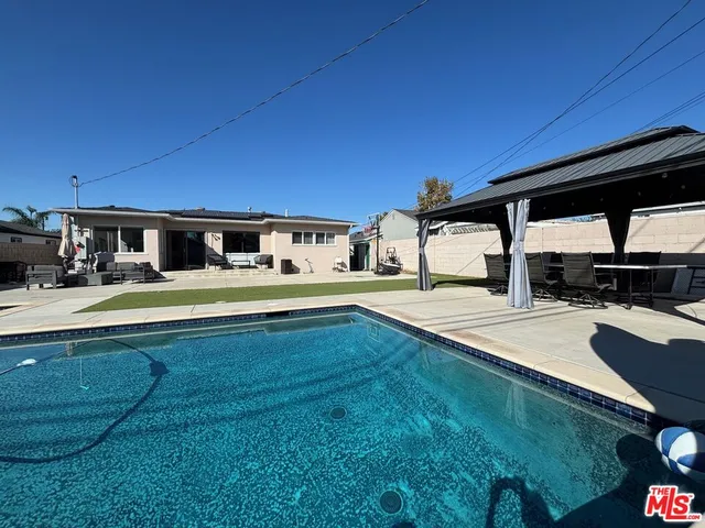 a swimming pool with outdoor view