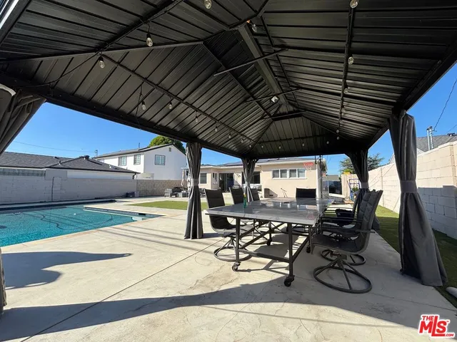 a view of a kitchen with seating area