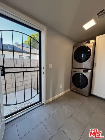 a view of a washer and dryer in a room