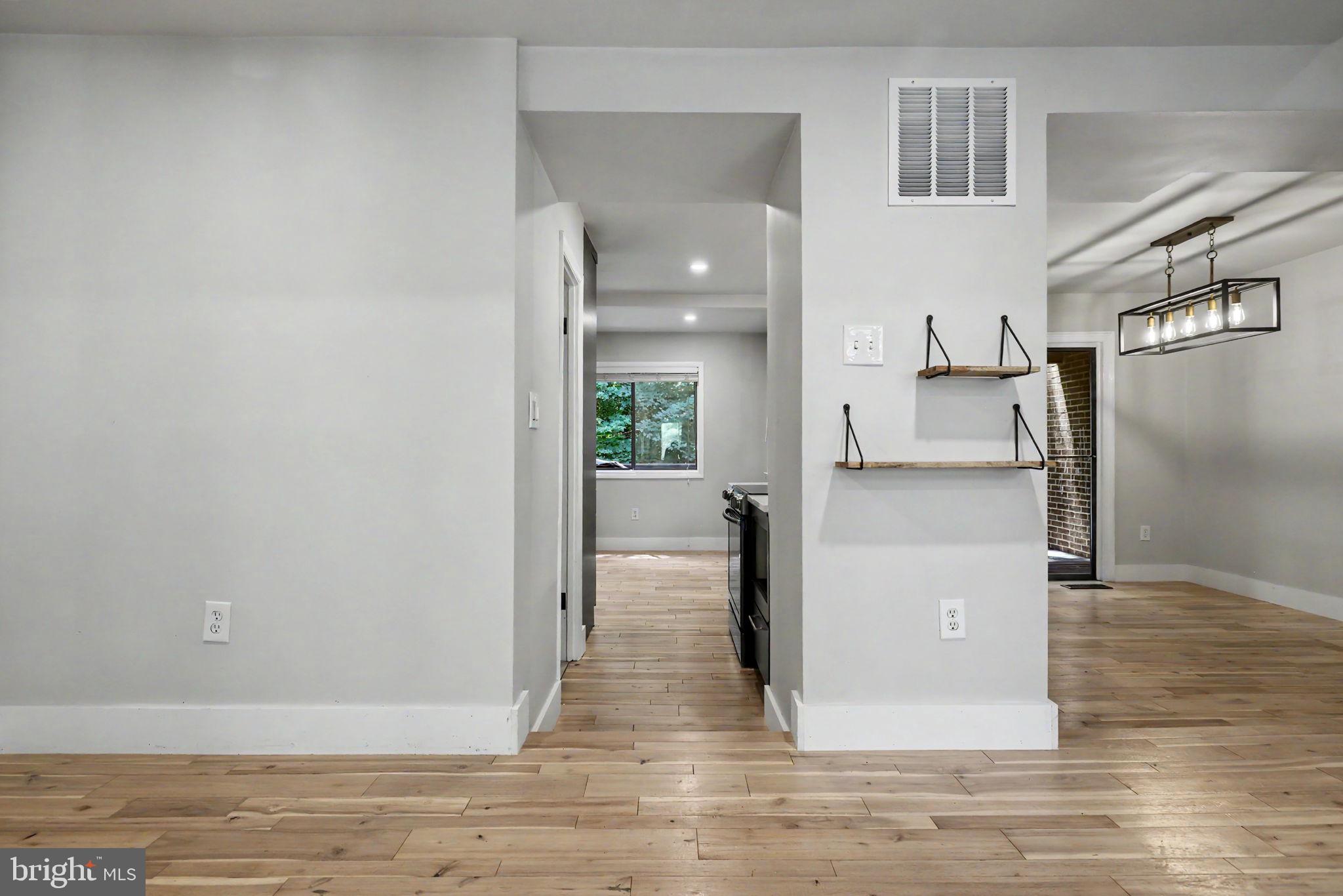 2105 Glencourse Lane Reston, VA 20191 - Photo 9 of 74 Front front foyer looking toward kitchen