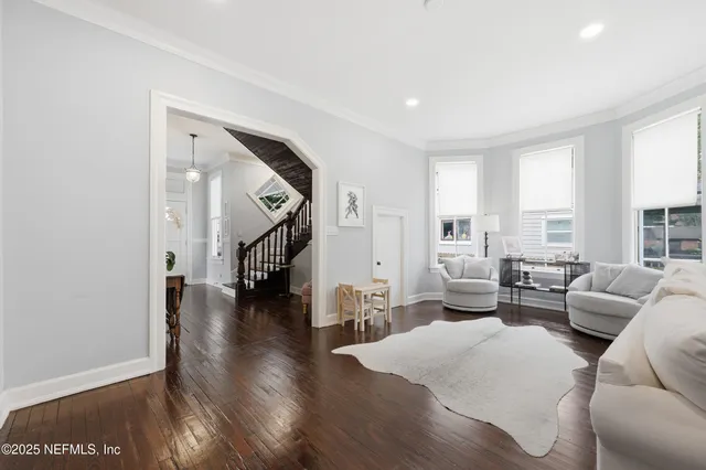 a bathroom with a granite countertop toilet a sink and bathtub