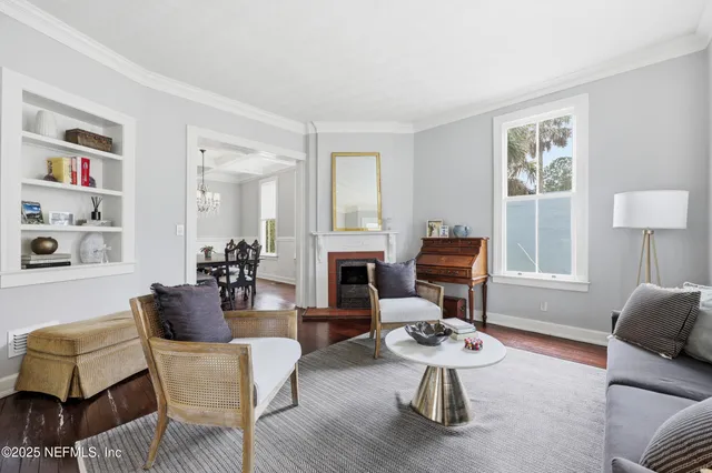 a kitchen with granite countertop a sink a counter space appliances and cabinets