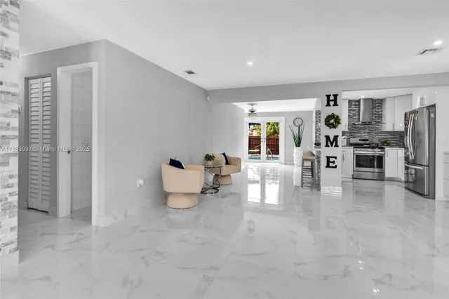 a bathroom with a toilet and shower