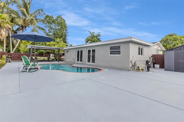 a view of an chairs and tables in the patio