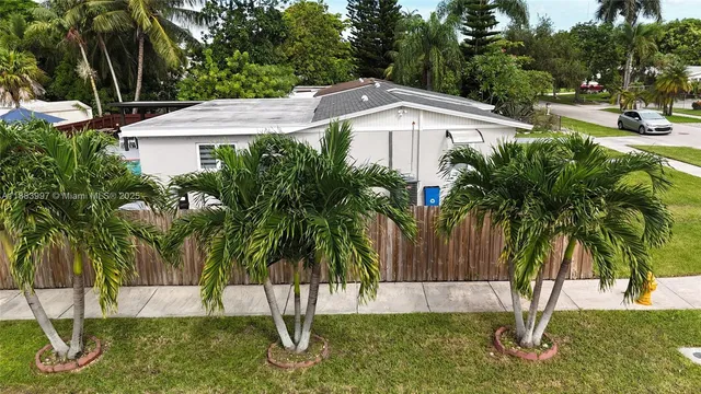 a kitchen with a refrigerator sink and microwave