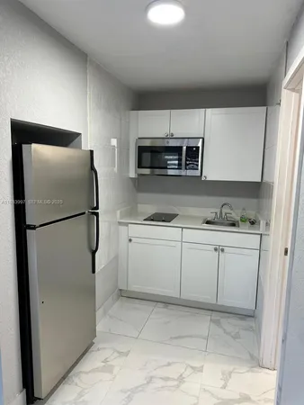 a view of outdoor space and front view of a house