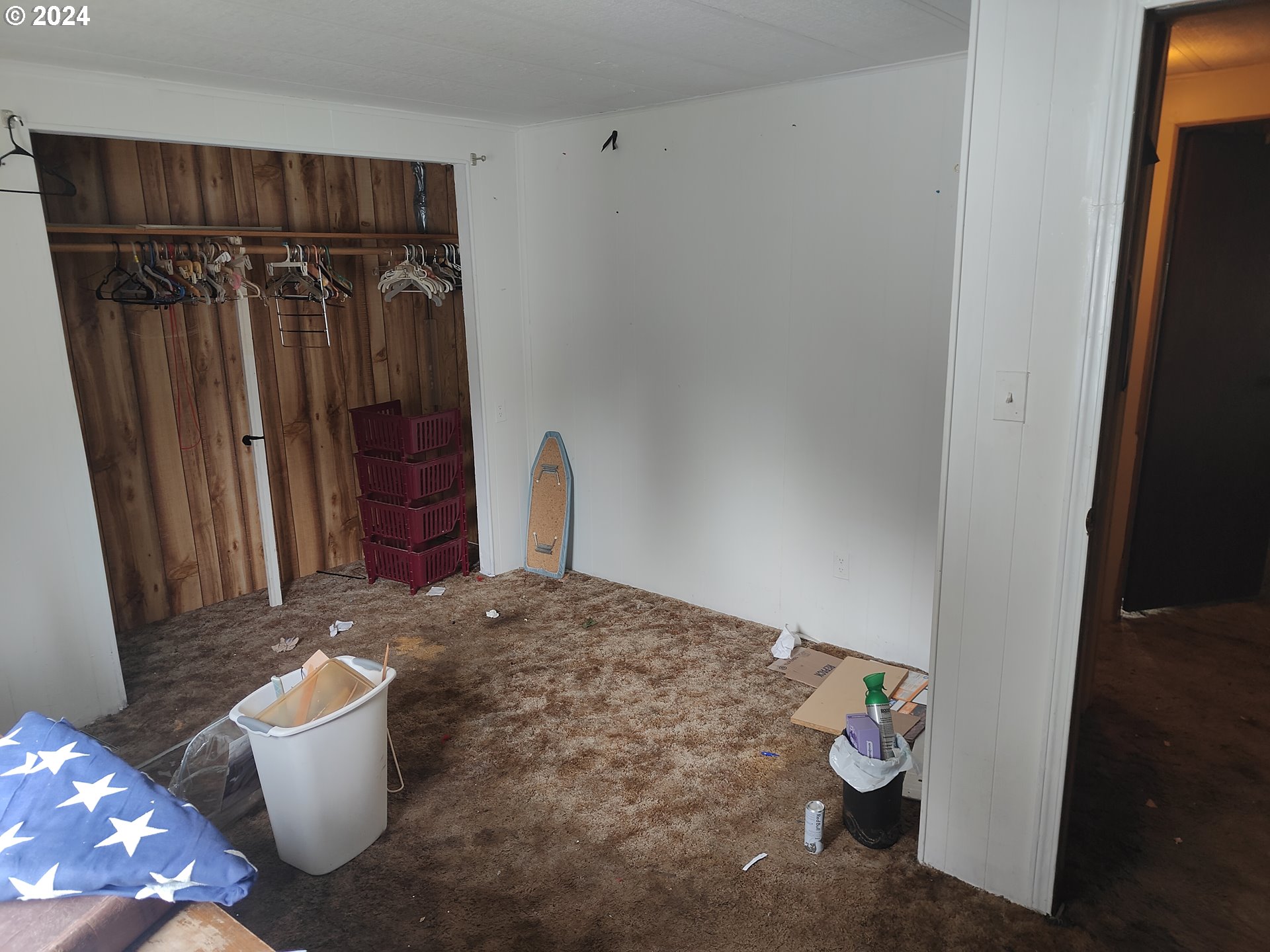 244 Bay Road Winlock, WA 98596 - Photo 13 of 29 a view of an empty room with wooden floor and a window