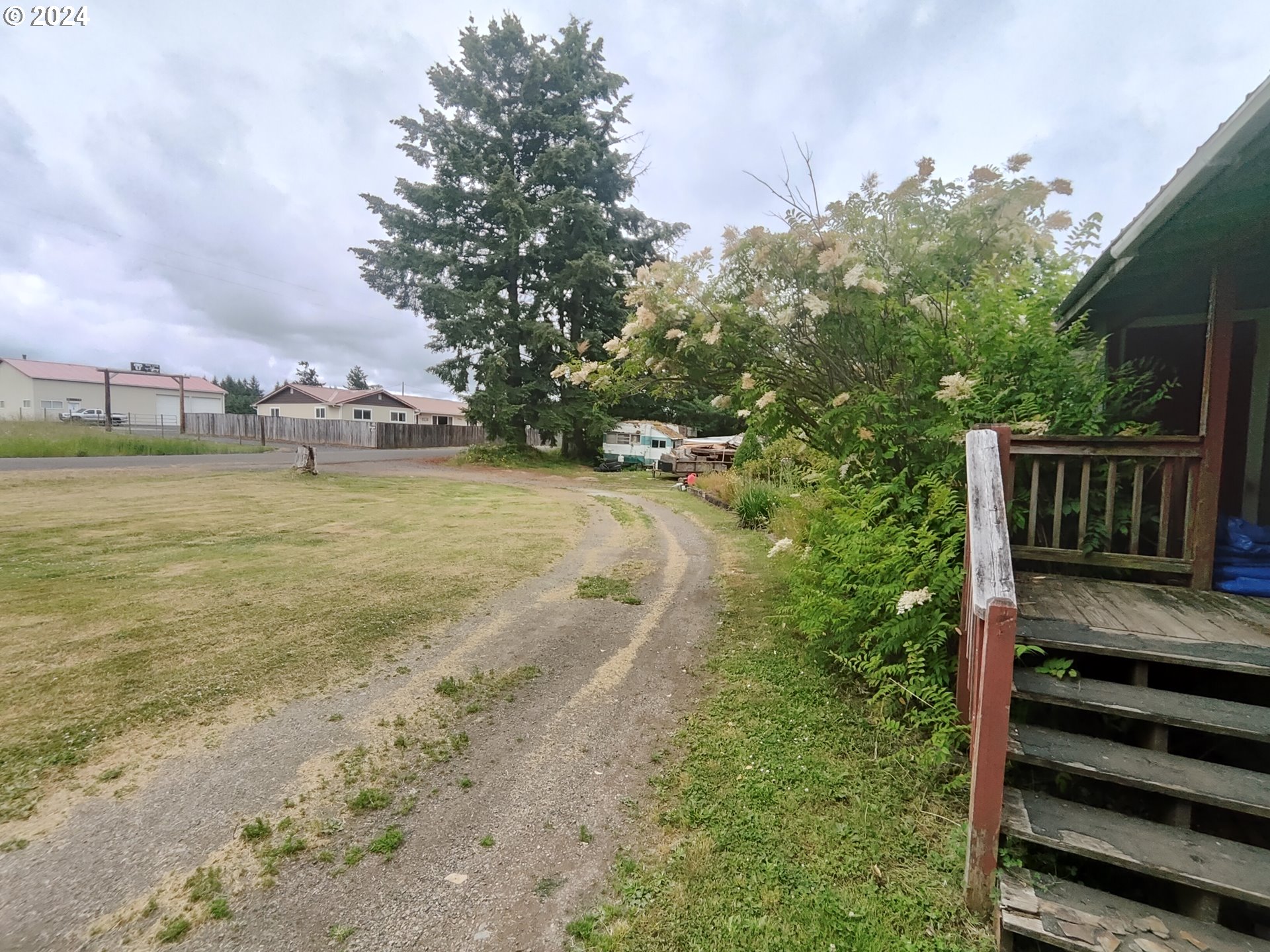 244 Bay Road Winlock, WA 98596 - Photo 14 of 29 a view of a yard with an outdoor space