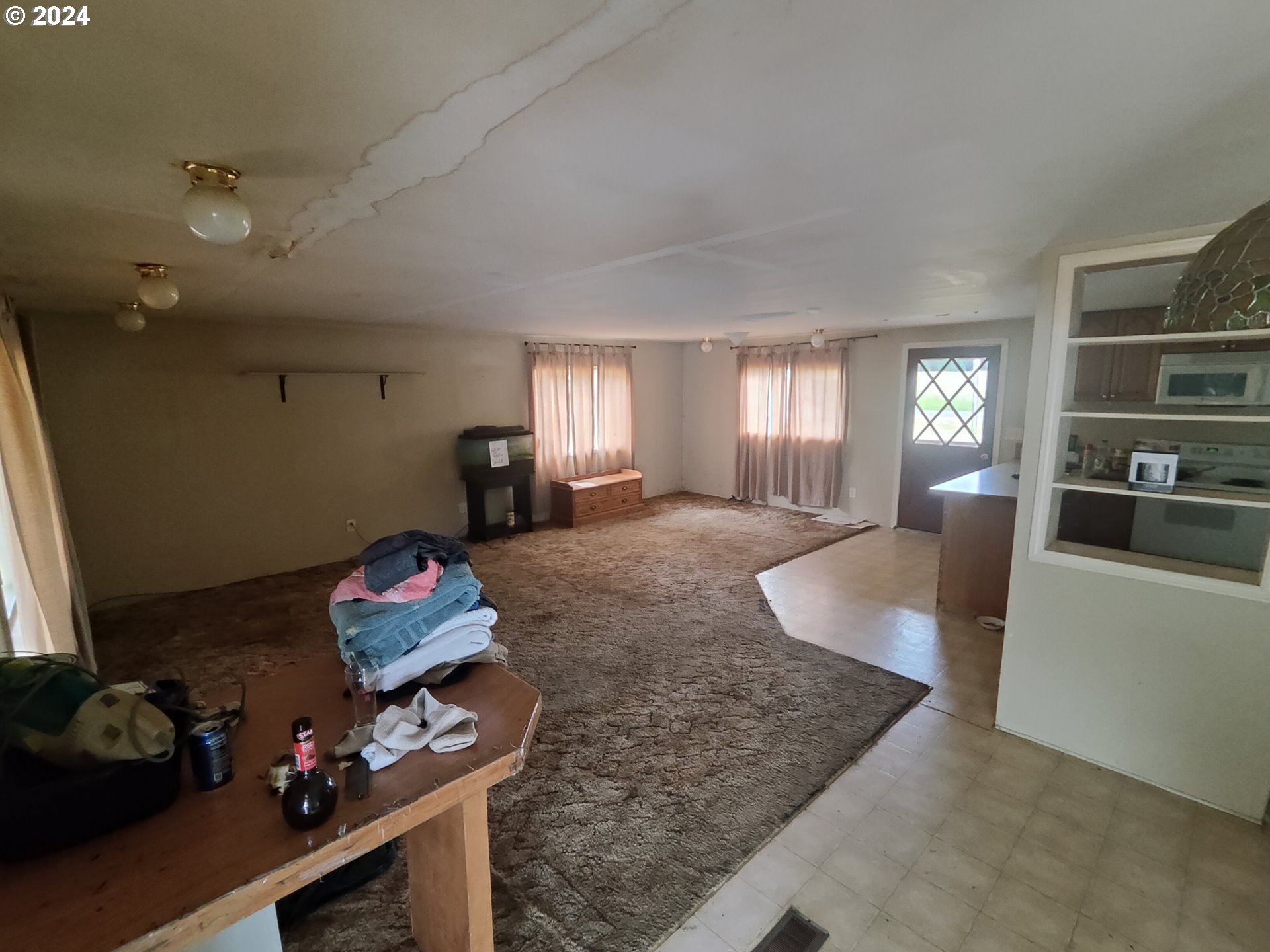 244 Bay Road Winlock, WA 98596 - Photo 6 of 29 a living room with furniture and a wooden floor