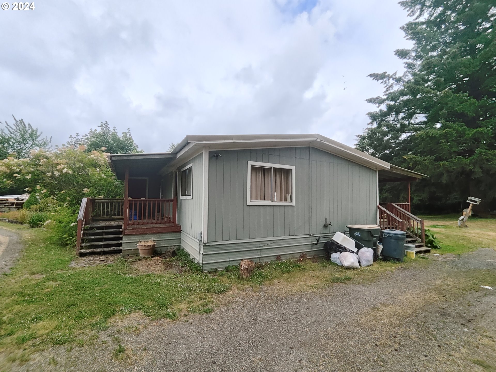 244 Bay Road Winlock, WA 98596 - Photo 7 of 29 a view of a small house and a yard