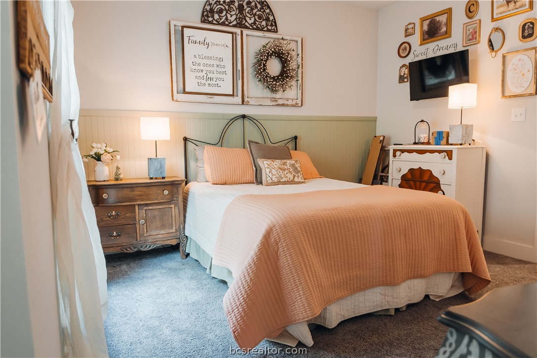 5036 Glory Road Bryan, TX 77808 - Photo 30 of 50 Bedroom en-suite located in front of home is bright and relaxing