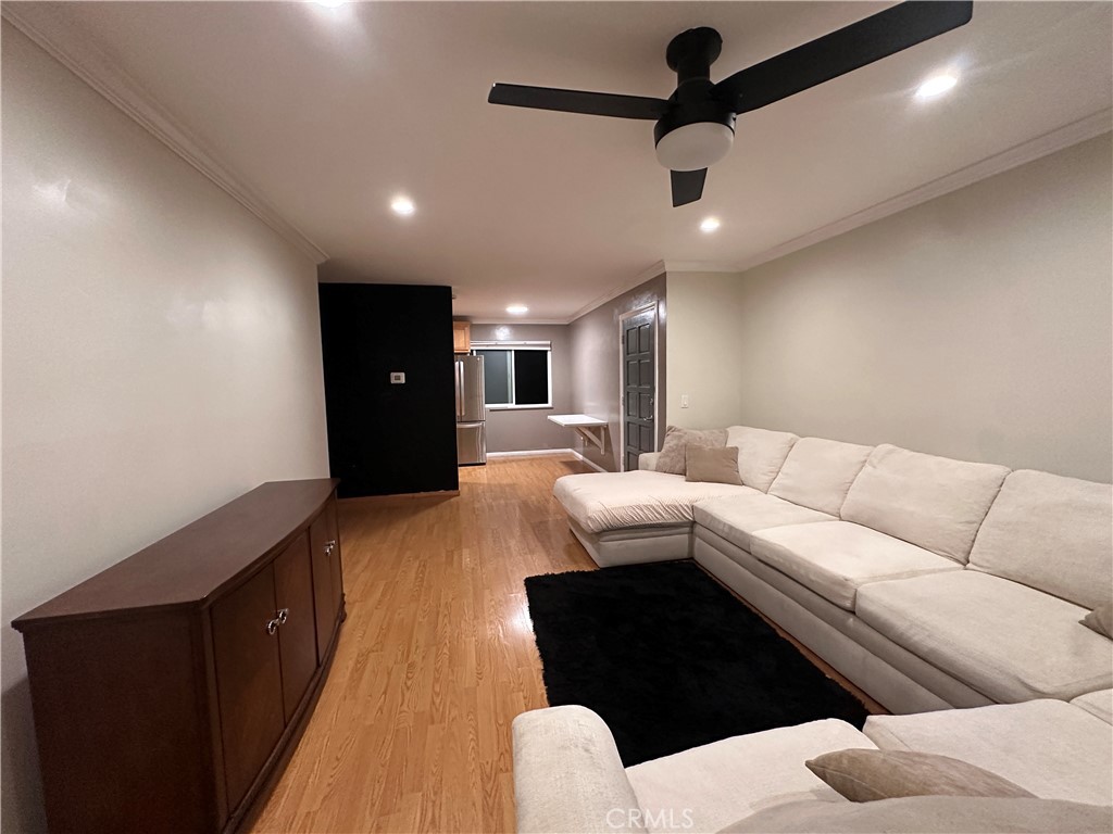 6600 Warner Avenue, Unit 210 Huntington Beach, CA 92647 - Photo 18 of 47 a living room with furniture