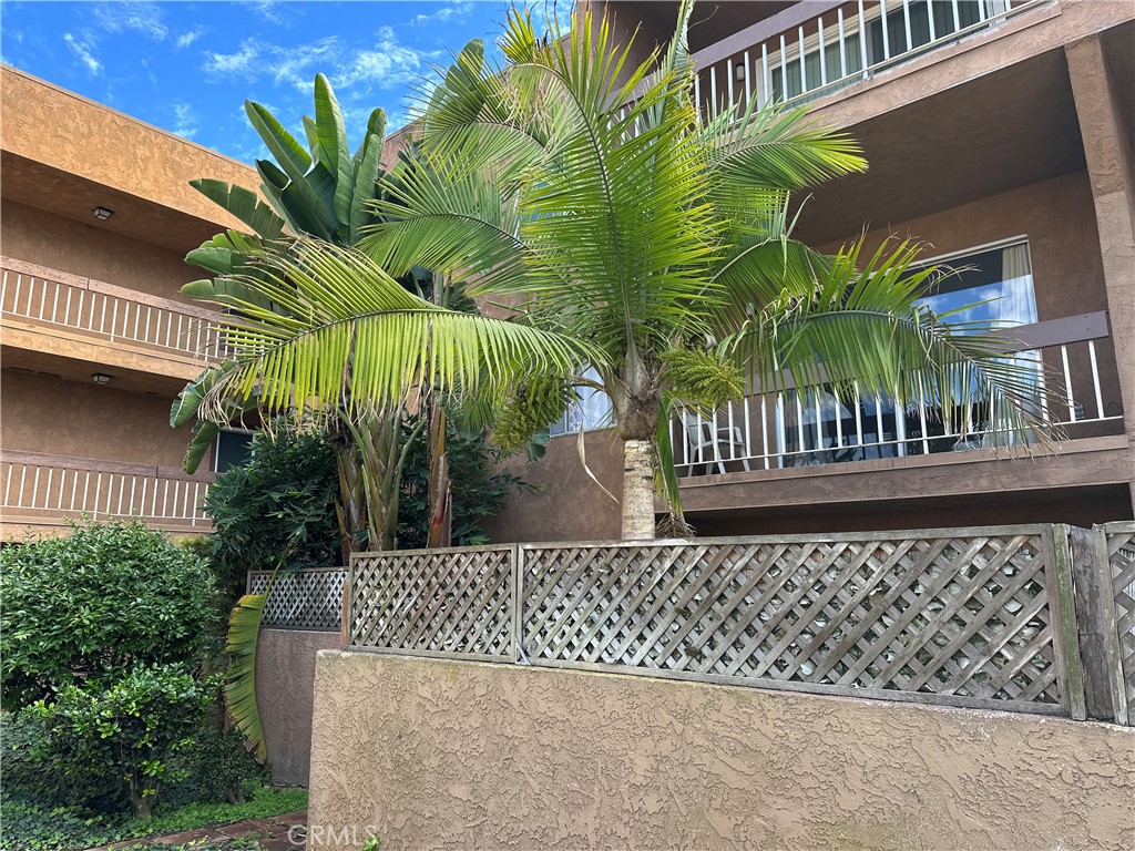 6600 Warner Avenue, Unit 210 Huntington Beach, CA 92647 - Photo 22 of 47 a view of a backyard