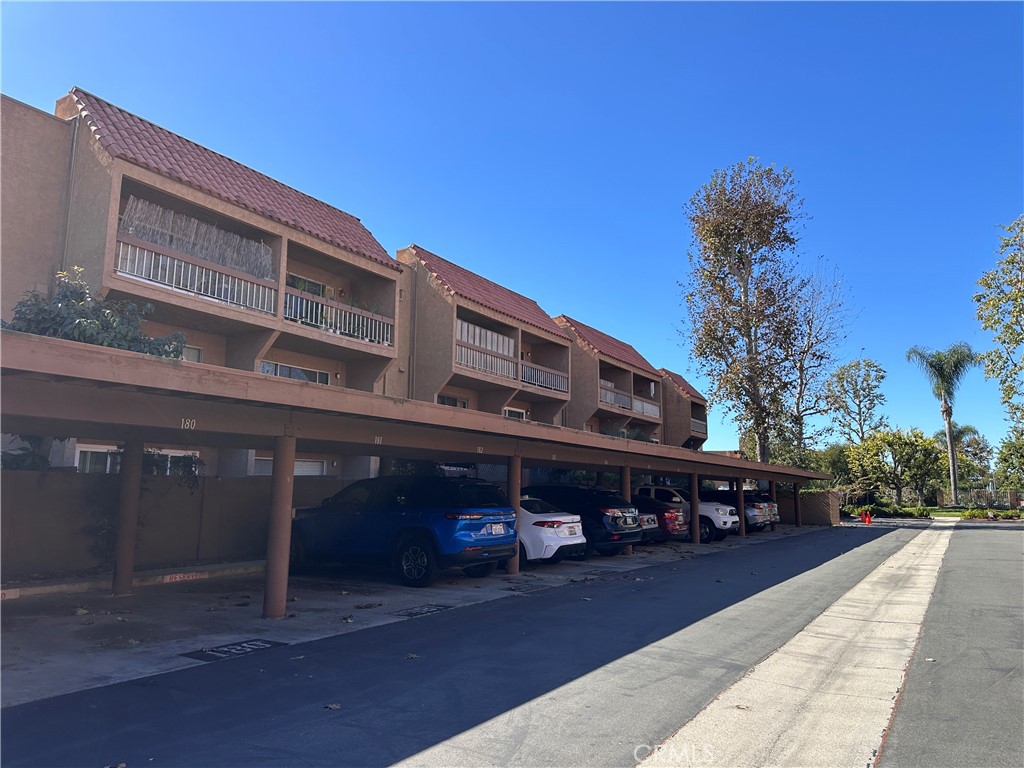 6600 Warner Avenue, Unit 210 Huntington Beach, CA 92647 - Photo 32 of 47 a front view of a building with street view