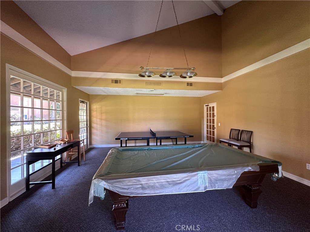 6600 Warner Avenue, Unit 210 Huntington Beach, CA 92647 - Photo 38 of 47 a room with pool table and window