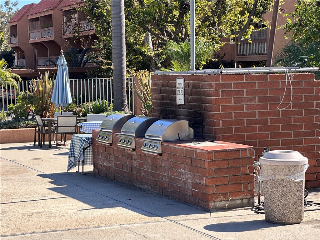 6600 Warner Avenue, Unit 210 Huntington Beach, CA 92647 - Photo 43 of 47 a view of outdoor sitting area with furniture