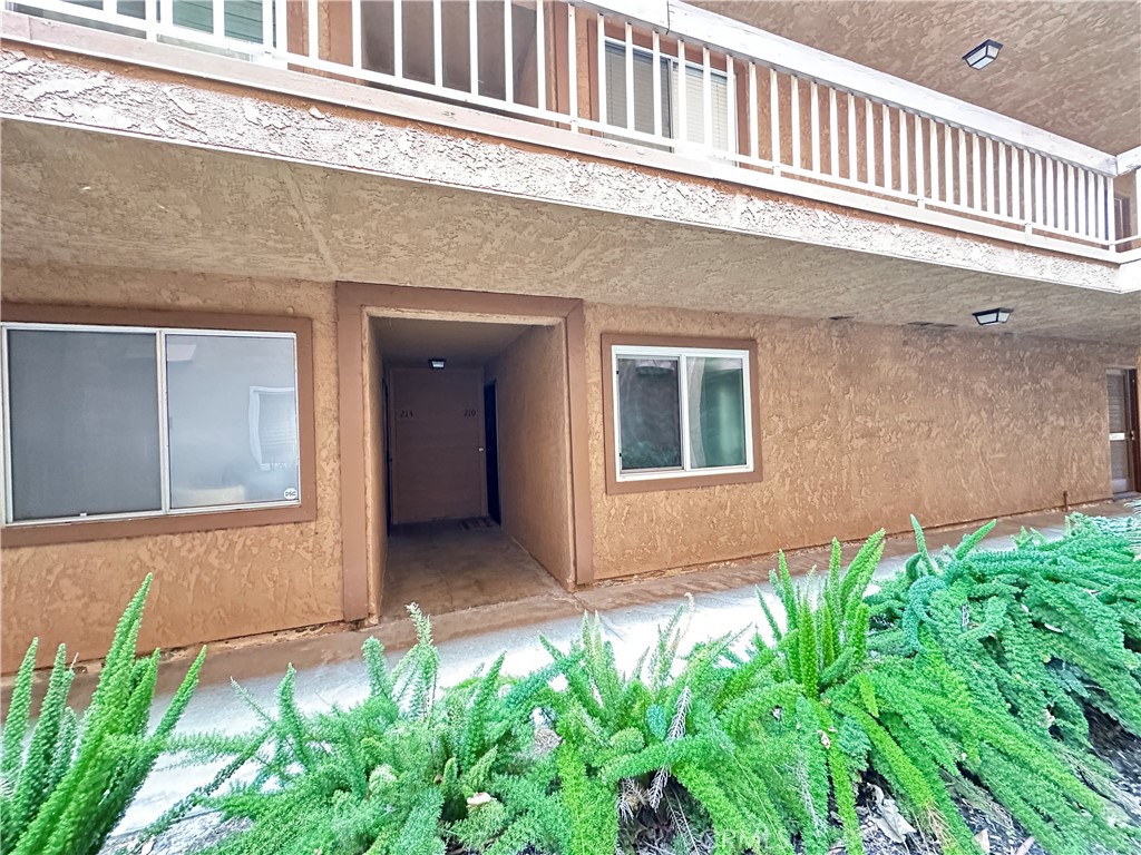 6600 Warner Avenue, Unit 210 Huntington Beach, CA 92647 - Photo 8 of 47 front view of a house